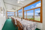 Gather Around the Dining Porch Table to Enjoy Meals with Loved Ones and Scenic Lake Views